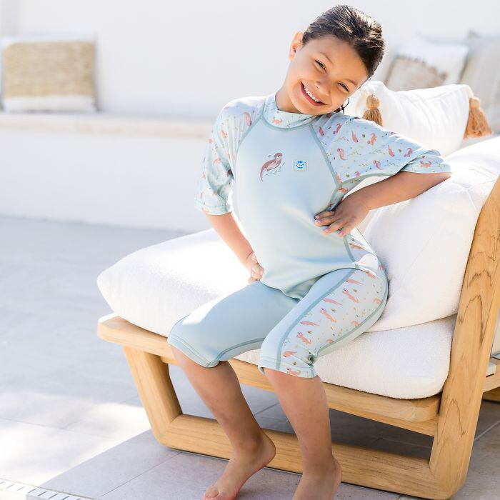 Splash About Dětská neoprenová UV kombinéza Playful Otters