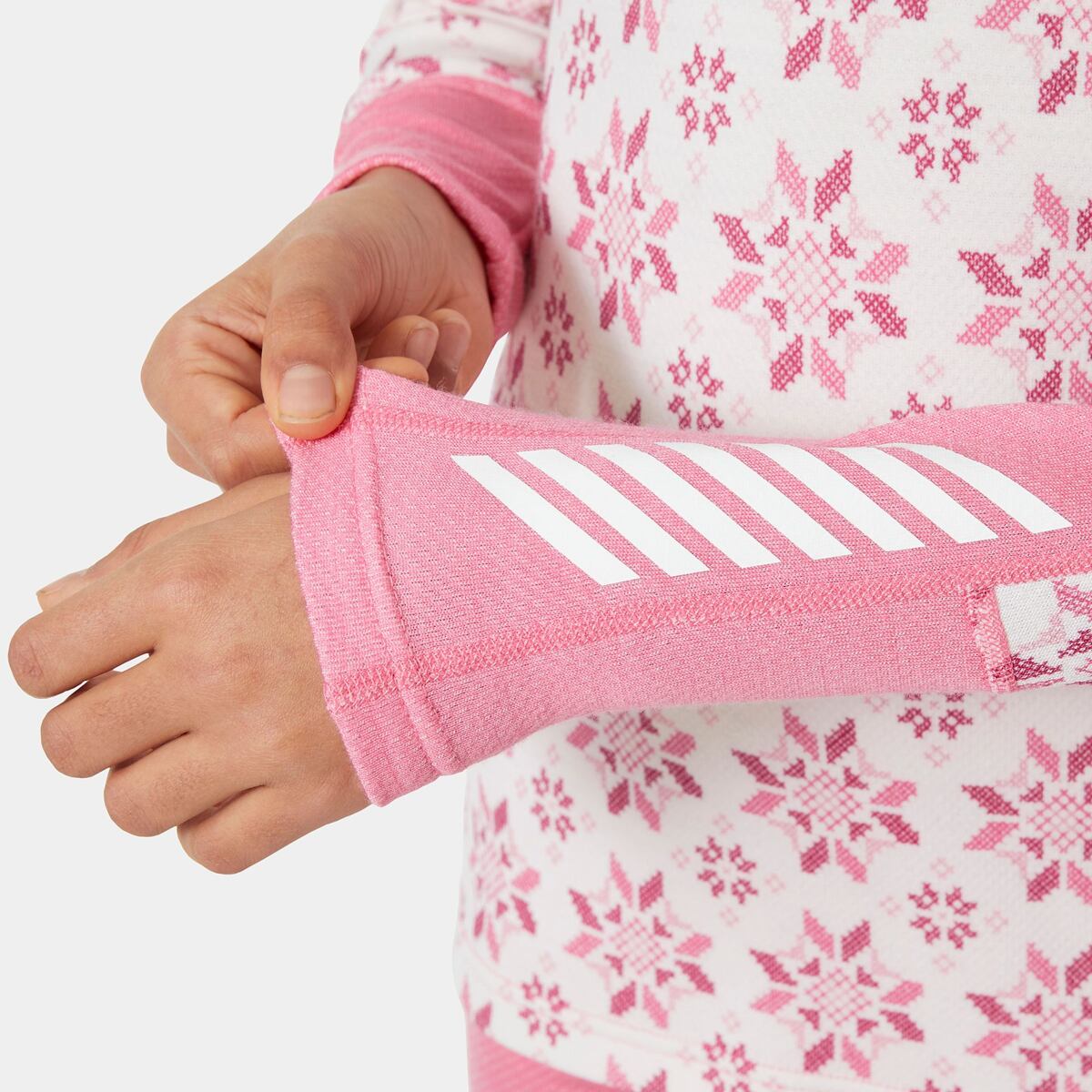 Helly Hansen Juniorské termoprádlo JR Graphic Lifa Merino set - sugar pink snowflake aop